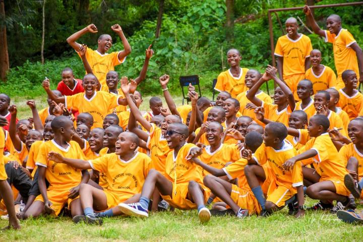 Students celebrating together during a team game