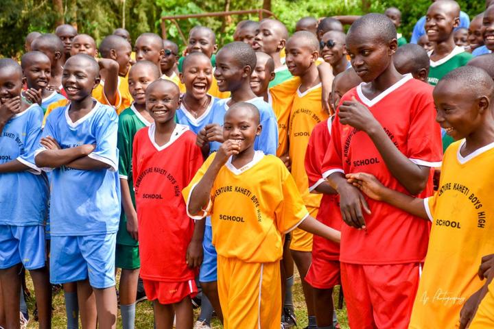 Students cheering one another during a school team game