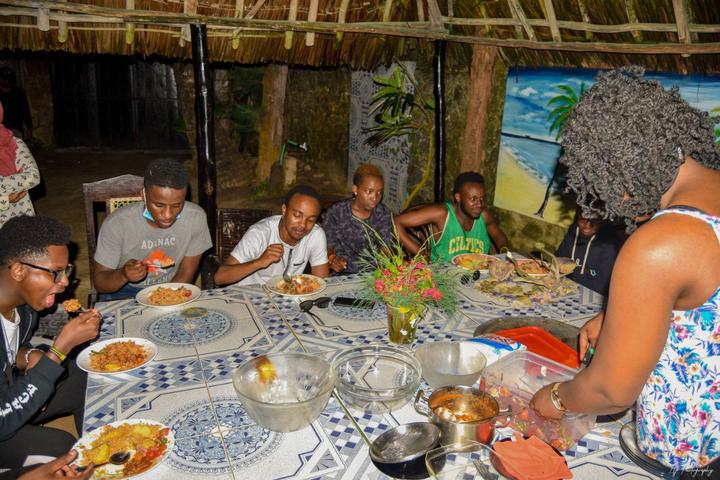 Mentees sitting together during a shared meal