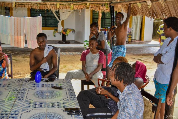Young people relaxing together at the venue