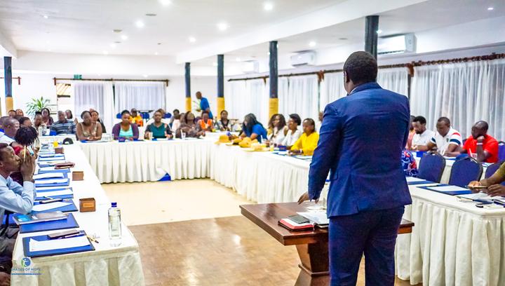 A speaker addressing an audience at a youth conference